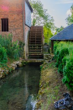 Watermill in the village Orbec, in the Calvados department in the Normandy region in northwestern France