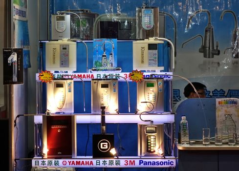 KAOHSIUNG, TAIWAN -- APRIL 5, 2019: A booth with water purifiers at a sales and promotional fair for electric household appliances.
