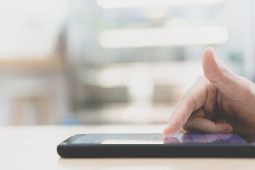 Woman hand use smartphone to do work business, social network, communication in public space.