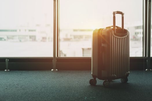 Travel luggage at waiting area in the airport. sign of travelling freedom concept.