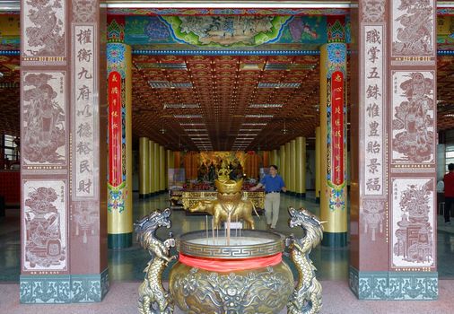 KAOHSIUNG, TAIWAN -- JUNE 24, 2014: The entrance hall of the Wumiao Temple in Kaohsiung shows colorful paintings and sculptures of religious and mythological themes.