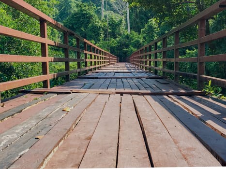 The bridge goes into the forest to go to Haew Narok waterfall.