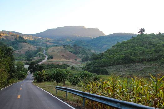 The road route that created the mountain traverses in the morning.