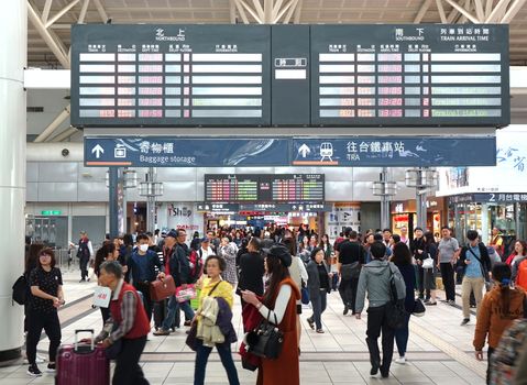 KAOHSIUNG, TAIWAN -- JANUARY 5, 2019: Commuters and travelers crowd the concourse of the Taiwan High Speed Railway station in Zuoying.
