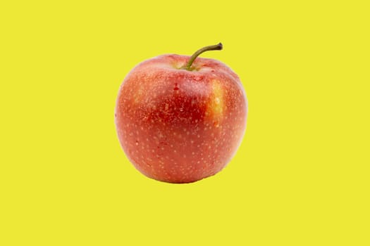 Apple fruit on yellow background. Selective focus