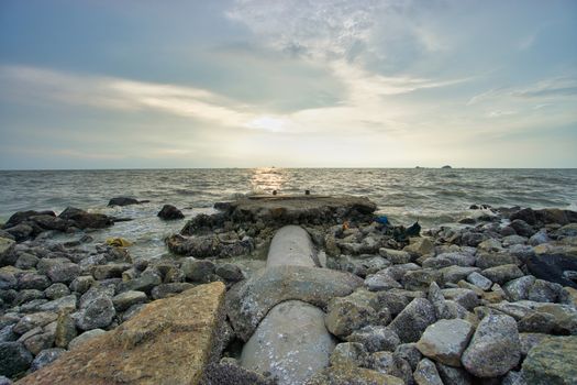 Peaceful beach view and waves during sunset at Jeram, Kuala Selangor Malaysia