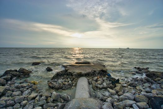 Peaceful beach view and waves during sunset at Jeram, Kuala Selangor Malaysia