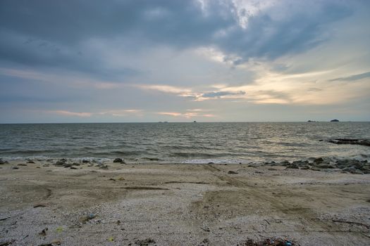 Peaceful beach view and waves during sunset at Jeram, Kuala Selangor Malaysia