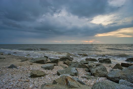 Peaceful beach view and waves during sunset at Jeram, Kuala Selangor Malaysia