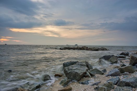 Peaceful beach view and waves during sunset at Jeram, Kuala Selangor Malaysia