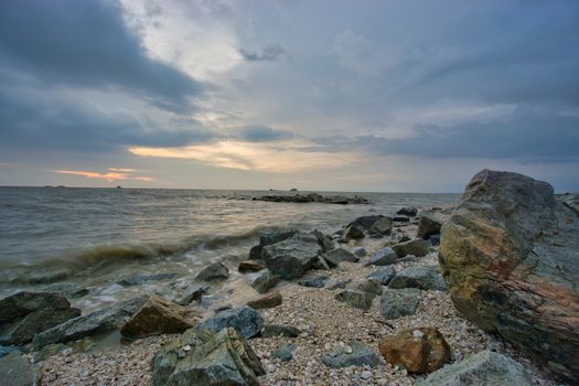 Peaceful beach view and waves during sunset at Jeram, Kuala Selangor Malaysia