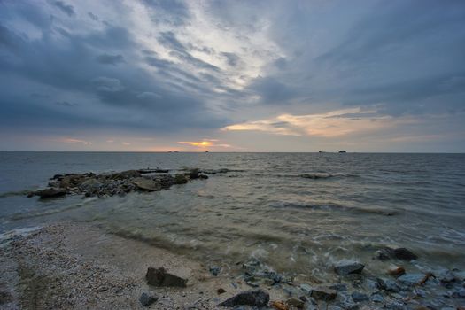 Peaceful beach view and waves during sunset at Jeram, Kuala Selangor Malaysia