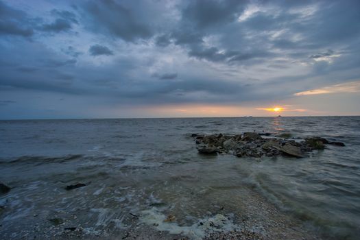 Peaceful beach view and waves during sunset at Jeram, Kuala Selangor Malaysia