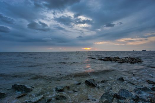 Peaceful beach view and waves during sunset at Jeram, Kuala Selangor Malaysia