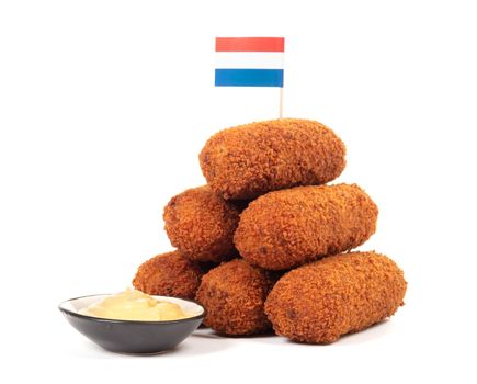 Brown crusty dutch kroketten with dutch flag, isolated on a white background