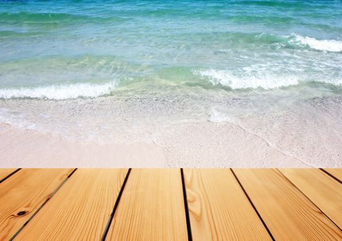 Empty wooden deck table over sea background, Summer concept