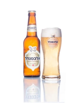 HAIFA, ISRAEL - SEP 16, 2014: A bottle and a glass of alexander blonde beer, winner of the European beer star competition in 2014 (English-Style Golden Ale category) in Haifa, Israel