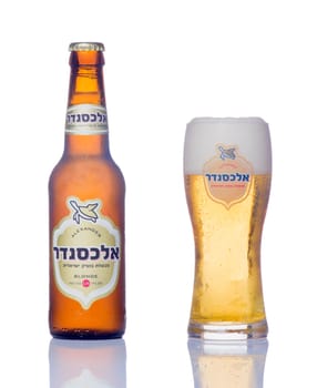 HAIFA, ISRAEL - SEP 27, 2014: A bottle and a glass of alexander blonde beer, winner of the European beer star competition in 2014 (English-Style Golden Ale category) in Haifa, Israel