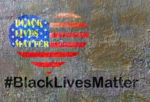 Black Lives Matter hashtag text liberation banner designs stencil heart flag of the United States of America city street Grey abstract background of a old concrete wall