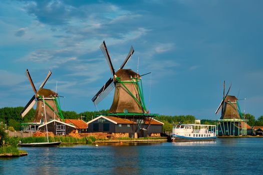 Netherlands rural lanscape - windmills at famous tourist site Zaanse Schans in Holland. Zaandam, Netherlands