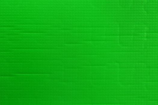 green sport or yoga foam mat surface flat texture and background.