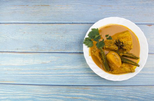 Spicy and tasty fish curry dish, Traditional Malaysian cuisine. Selective focus.