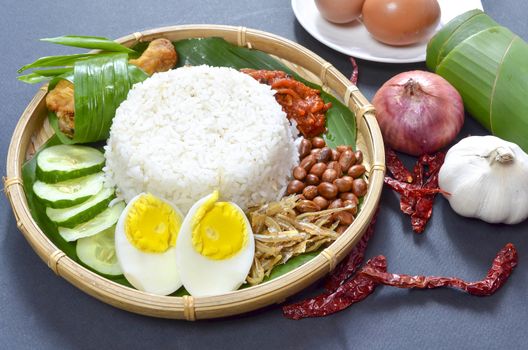 Nasi Lemak is a commonly found food in Malaysia, Brunei and Singapore. It is also an unofficial national food in Malaysia. Selective focus.