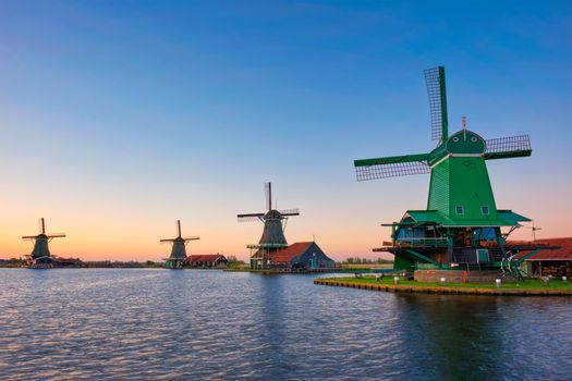 Netherlands rural lanscape - windmills at famous tourist site Zaanse Schans in Holland. Zaandam, Netherlands