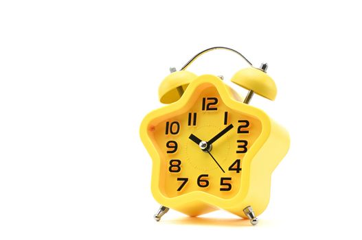 Yellow watch with five petals. Alarm clock on a white background