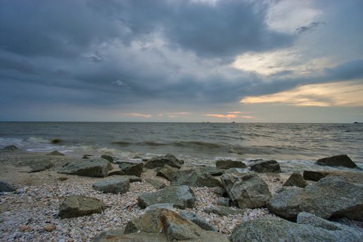 Peaceful beach view and waves during sunset at Jeram, Kuala Selangor Malaysia