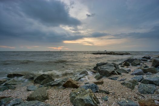 Peaceful beach view and waves during sunset at Jeram, Kuala Selangor Malaysia