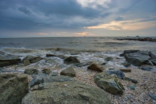 Peaceful beach view and waves during sunset at Jeram, Kuala Selangor Malaysia