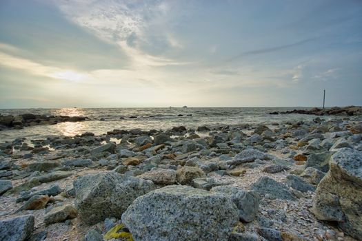 Peaceful beach view and waves during sunset at Jeram, Kuala Selangor Malaysia