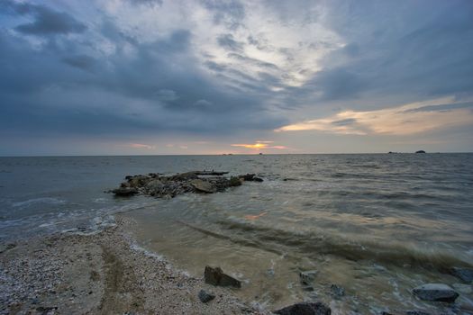 Peaceful beach view and waves during sunset at Jeram, Kuala Selangor Malaysia