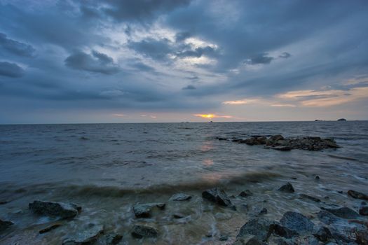 Peaceful beach view and waves during sunset at Jeram, Kuala Selangor Malaysia