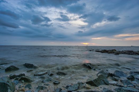 Peaceful beach view and waves during sunset at Jeram, Kuala Selangor Malaysia