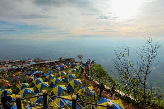  tourist With tents and accommodation for tourists who come to relax and watch the fog in the morning at Phu Thap Berk. : October 29,2016 ,Phu Tubberk, Phetchabun Province, Thailand.