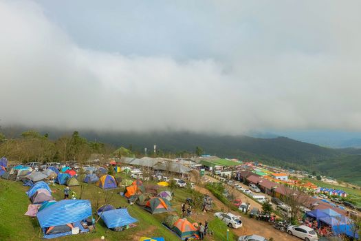 tourist With tents and accommodation for tourists who come to relax and watch the fog in the morning at Phu Thap Berk. : October 29,2016 ,Phu Tubberk, Phetchabun Province, Thailand.