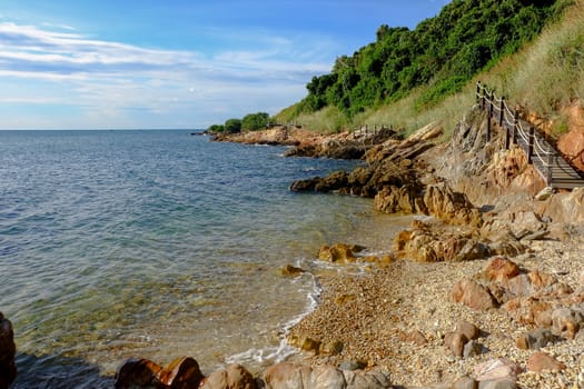 View of the beach around the walking path at Khao Laem Ya, Rayong, Thailand.