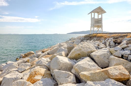 White pavilion with mountain views And the beautiful sea, famous landmark of Khao Laem Ya National Park, Rayong Province.