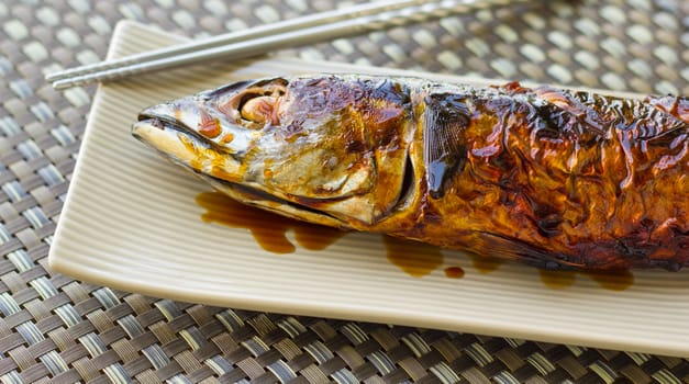 A saba Fish Grilled on a japanese plate