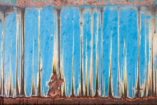 A rusty panel is transformed into a work of art.