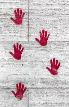 Bloody hand print on wall