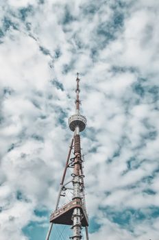 TV tower in Tbilisi Georgia against a blue cloudy sky