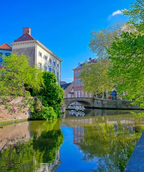 The canals of Bruges (Brugge), Belgium on a sunny day.