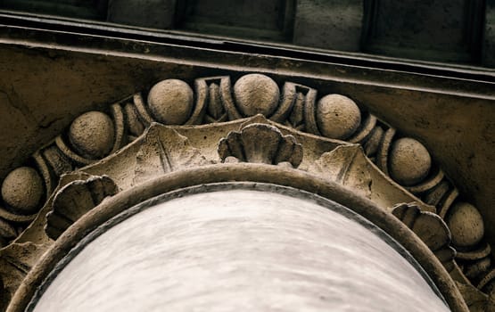 bottom view of the decor of an old antique column