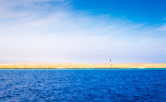 landscape coast of the Red Sea and blue sky with clouds in Sharm El Sheikh Egypt