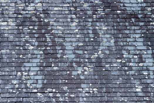Background of old stone roof tiles