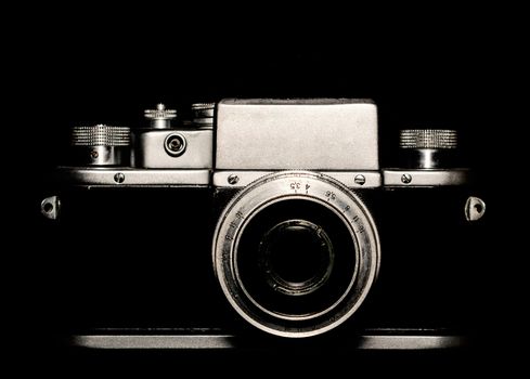 vintage camera on black background close up