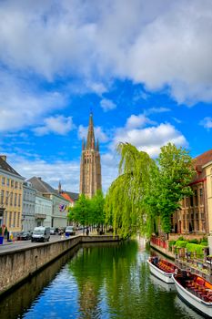 The canals of Bruges (Brugge), Belgium on a sunny day.